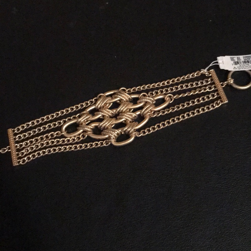 NWT Karma Bella gold tone bracelet.
